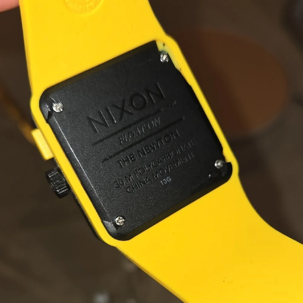 Nixon yellow smartwatch